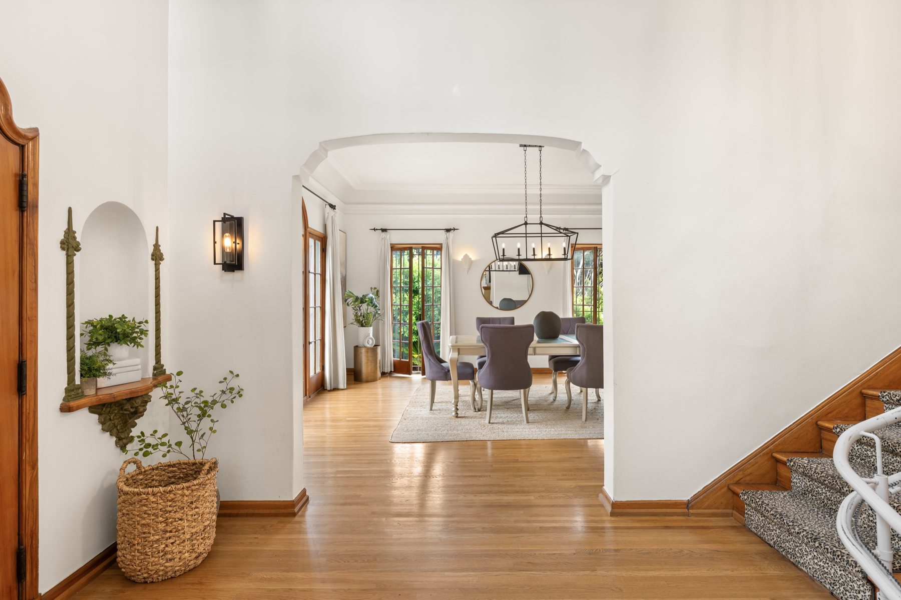 Entry with archway to dining room